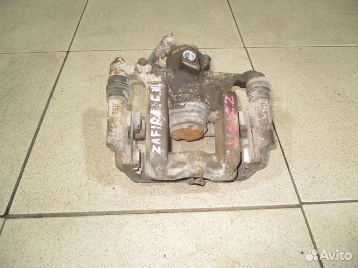 Суппорт задний левый Opel Zafira C