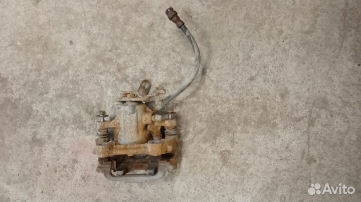 Суппорт тормозной задний Volkswagen, Skoda