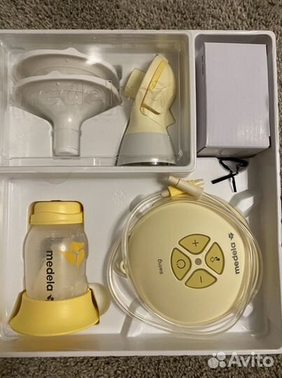 Электрический молокоотсос Medela Swing Flex желтый