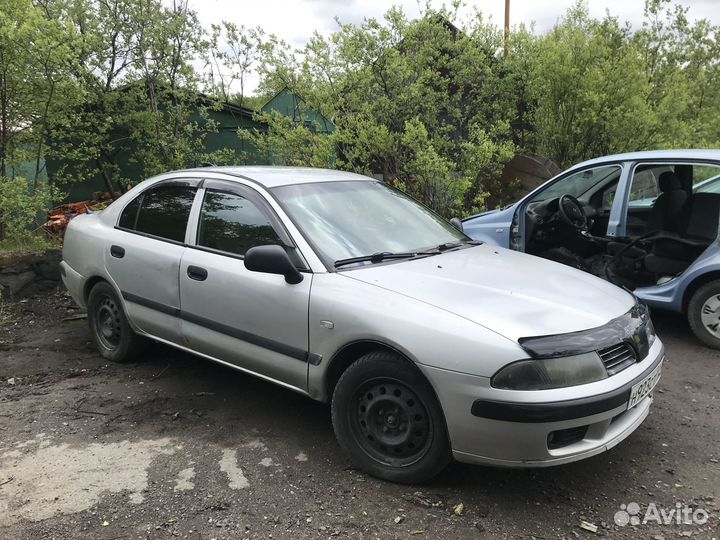 Запчасти на Mitsubishi Carisma 1,6 MT 2003 г
