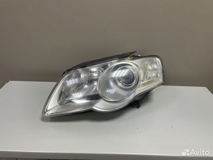 Фара левая Фольксваген Пассат Б6