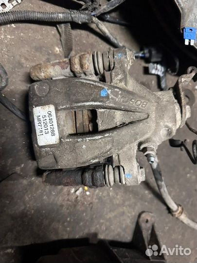 Суппорт задний правый Geely Emgrand Ec7 EC7