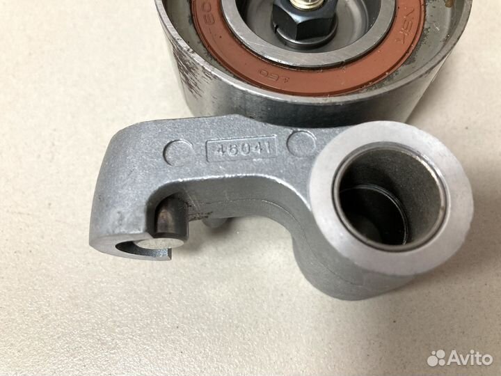 Ролик натяжителя ремня грм Toyota 1350546041 / 031