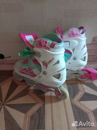 Роликовые коньки