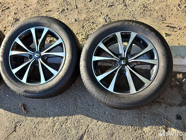 Оригинальные диски с шинами на Рено Аркана R17