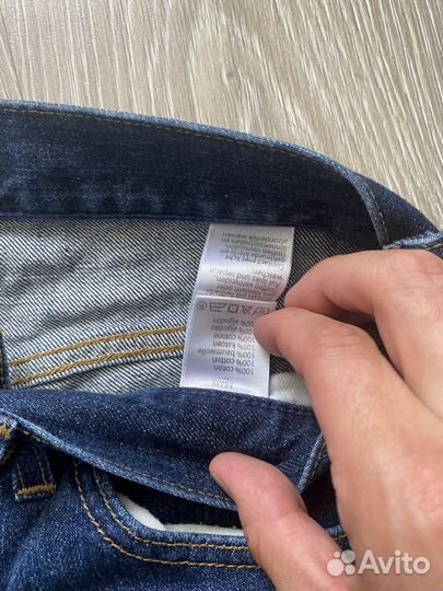 Джинсы Lacoste