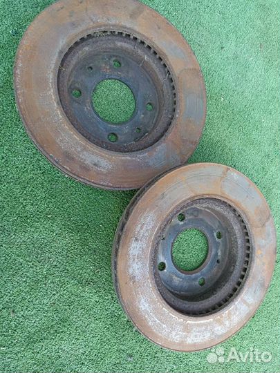 Тормозной диск передний Mitsubishi Lancer 9