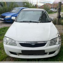 Mazda Familia 2.0 AT, 2000, 234 000 км