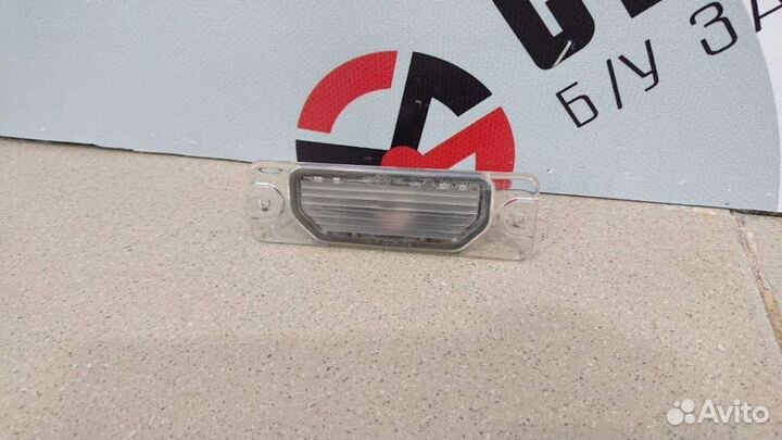 Фонарь подсветки номера Nissan Almera N16 2000-200