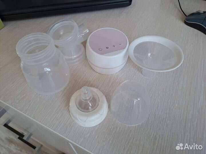 Электрический молокоотсос