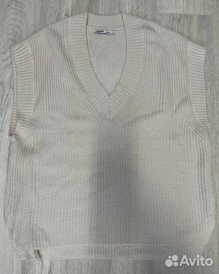 Жилеты женские