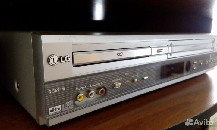 Lg dc90v3v6w белый. LG dc591w. DVD/VHS-плеер LG DC-600. LG dc90v9v9wn. VHS видеомагнитофон LG.