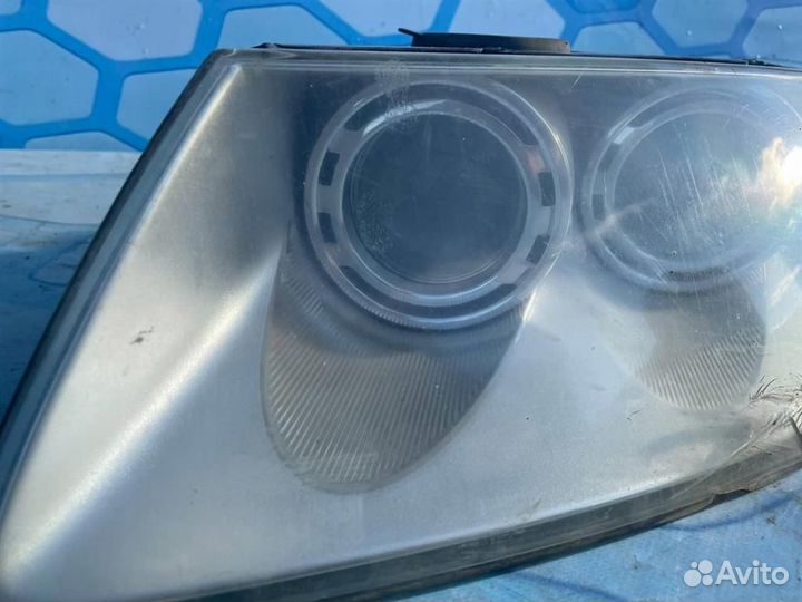 Фара левая ксенон 7L6941017BM