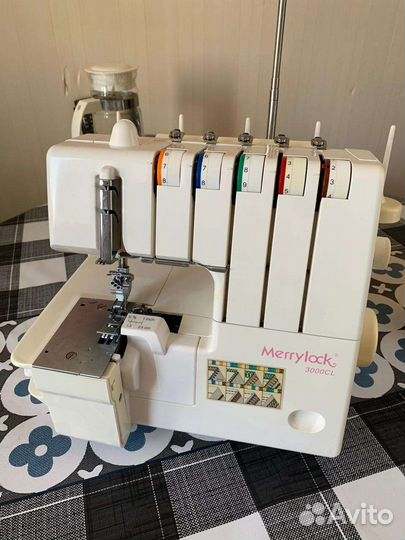 Коверлок merrylock