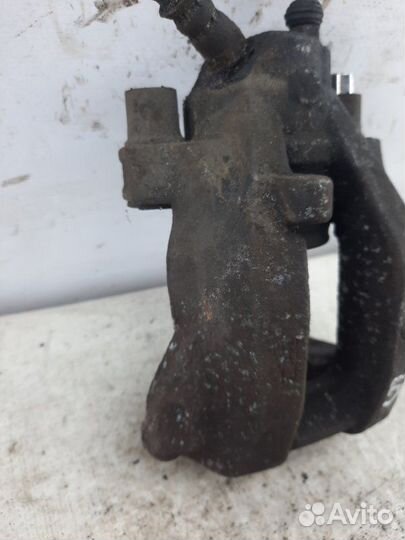 Суппорт тормозной задний левый Mercedes-Benz