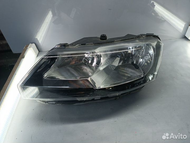 Фара левая Skoda Rapid