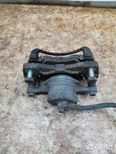 Суппорт тормозной передний левый Chevrolet Lacetti