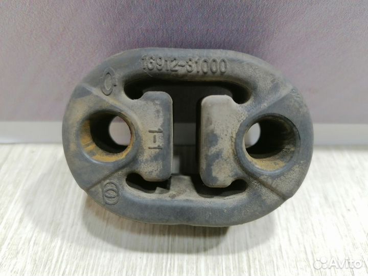 Кронштейн крепление глушителя Nissan almera classi