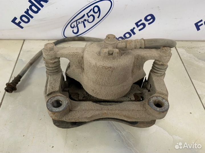 Суппорт передний правый Nissan X-Trail T31 2.0