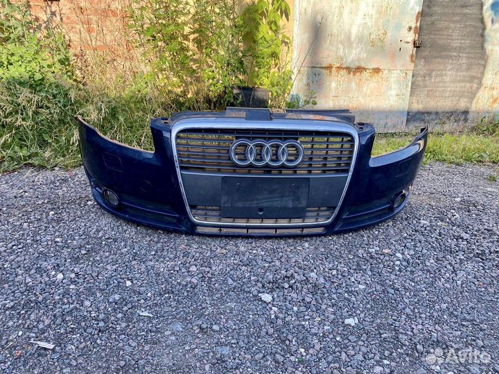 Передний бампер с решеткой на audi a4 b7