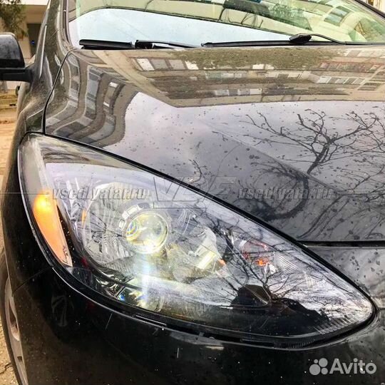 Стекло для фары Mazda 2 DE (2007-2015) Левое