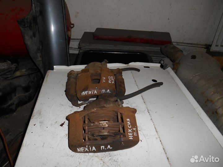 Суппорт передний левый Daewoo Nexia Дэу Нексия