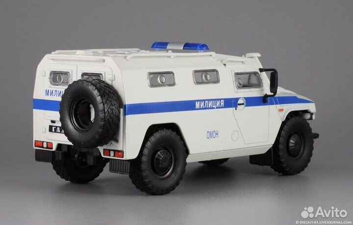 Модель автомобиля Газ Тигр Омон милиция 1:43
