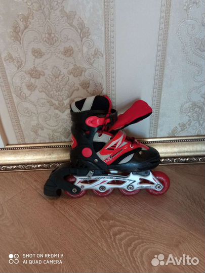 Роликовые коньки