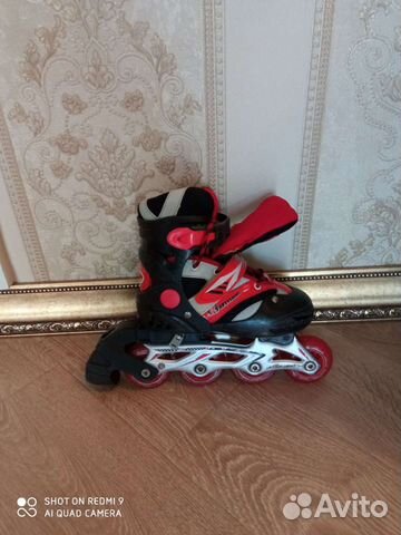 Роликовые коньки