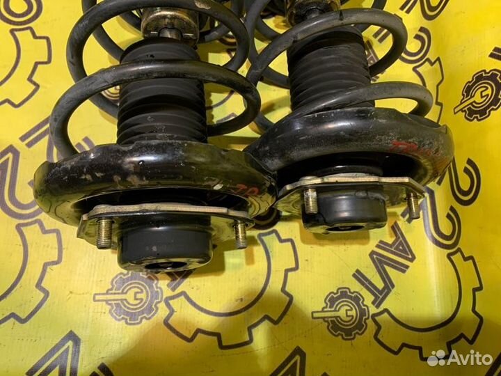 Стойки комплект передние Nissan Primera TP12