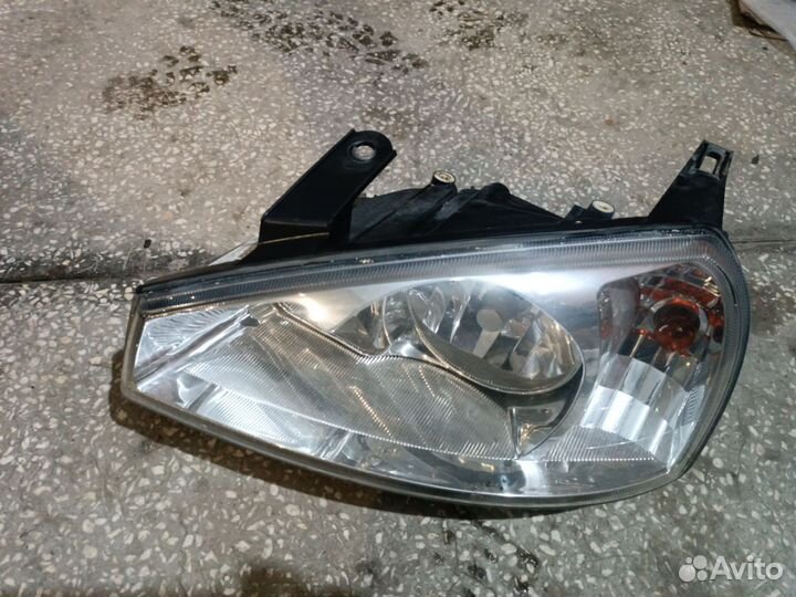 Передняя левая фара (оригинал) калина