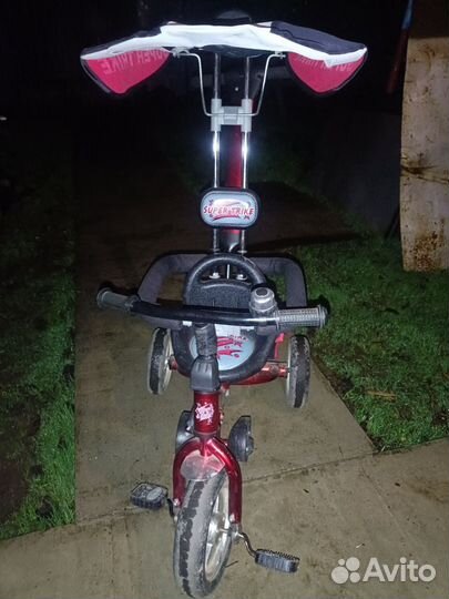 Детский трехколесный велосипед с ручкой