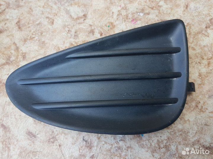 Заглушка бампера лев. перед. toyota vitz