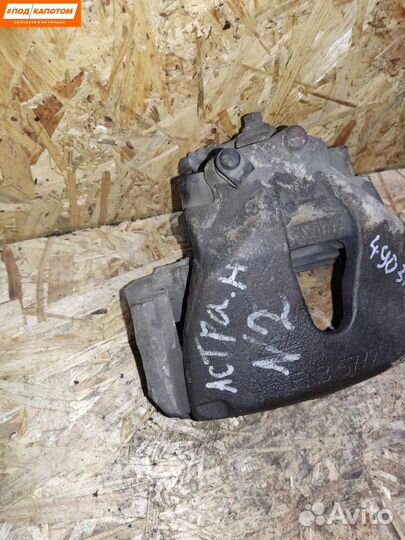 Суппорт тормозной передний правый Opel Astra H