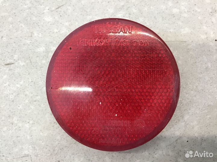 Отражатель в бампер задний левый Nissan X-Trail (T