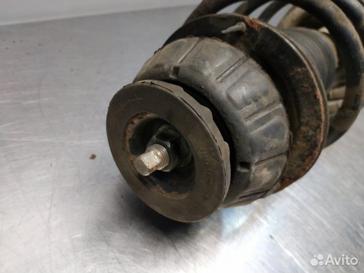 Стойка амортизатора передняя левая Kia Rio 3 UB