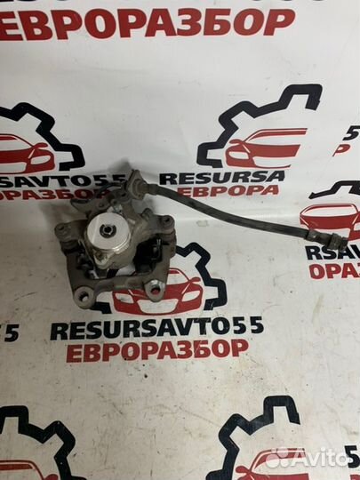 Суппорт тормозной задний левый Vw Passat B6 2.0