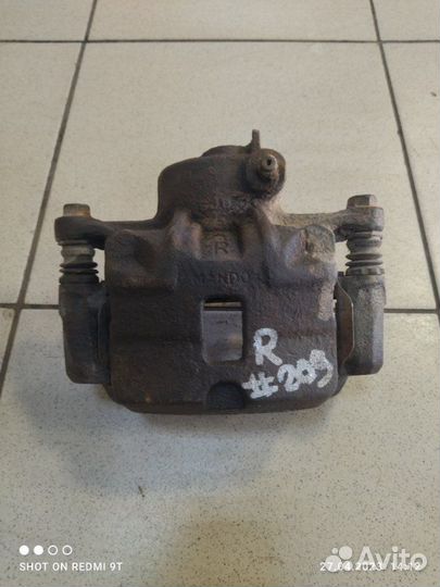 Суппорт тормозной передний правый Hyundai Galloper