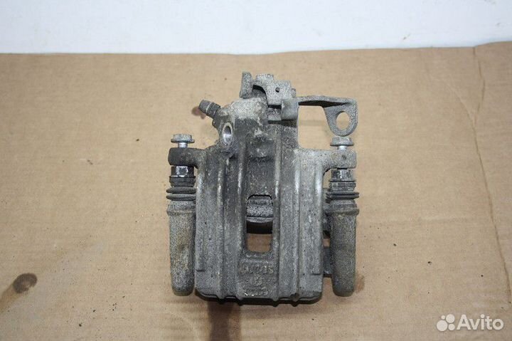 Суппорт задний левый Volkswagen polo (SED) 2011