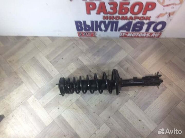 Амортизатор стойка передний правый Geely Mk