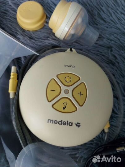 Молокоотсос medela электрический