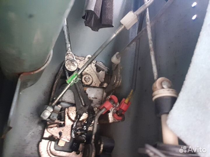 Замок двери передней левой Kia Sportage