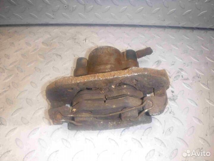 Суппорт тормозной передний правый Ford Fiesta