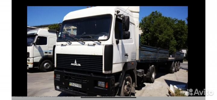Водитель на Маз с полуприцепом