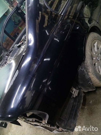 Крыло заднее правое бмв е39