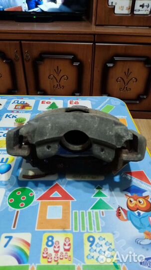 Суппорт передний левый Ford Fusion