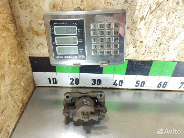 Суппорт передний левый Mazda Carol 2004-2009