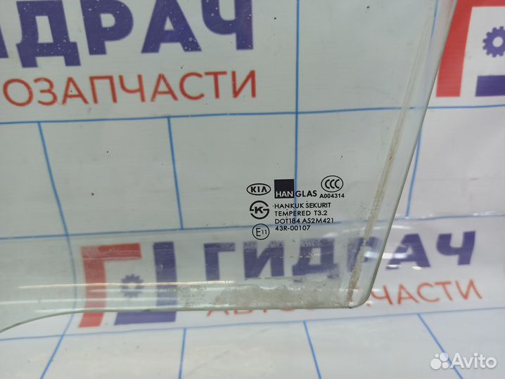 Стекло двери передней левой Kia Spectra