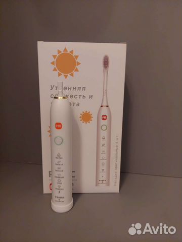 Электрическая зубная щетка