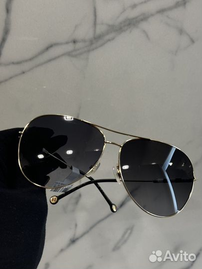 Солнцезащитные очки Carolina herrera